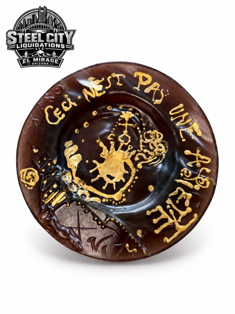 Dark brown Daum Salvador Dalí art glass plate with gold artwork
